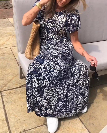 Tinne | Lange jurk met korte mouwen en bloemenprint