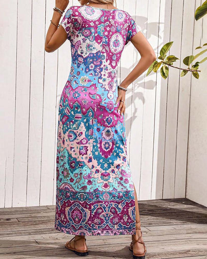 Bieke l Kleurrijke casual jurk met print en splitten