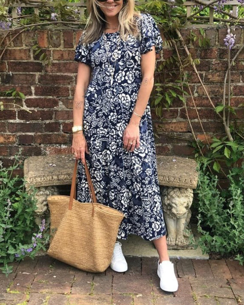 Tinne | Lange jurk met korte mouwen en bloemenprint