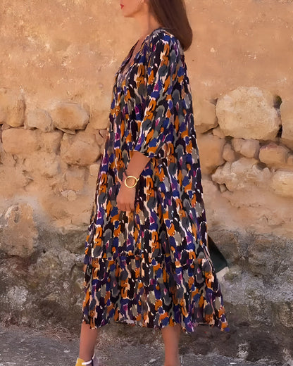 Jolien | V-hals jurk met retroprint