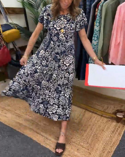 Tinne | Lange jurk met korte mouwen en bloemenprint