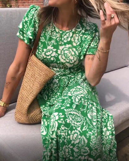 Tinne | Lange jurk met korte mouwen en bloemenprint